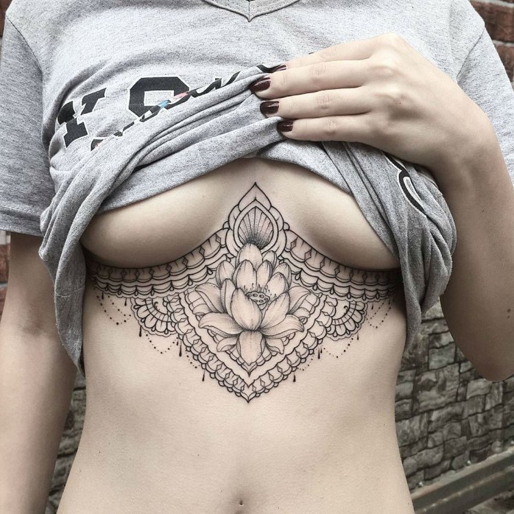 Women's tattoo under the chest