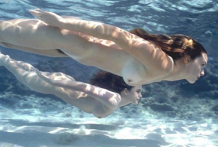 Naked girls in water