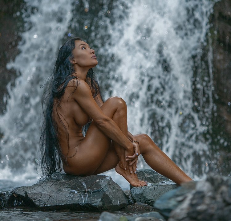 Naked girls at the waterfall