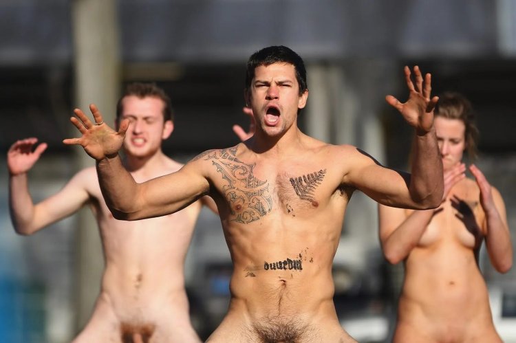 Naked football players on the field