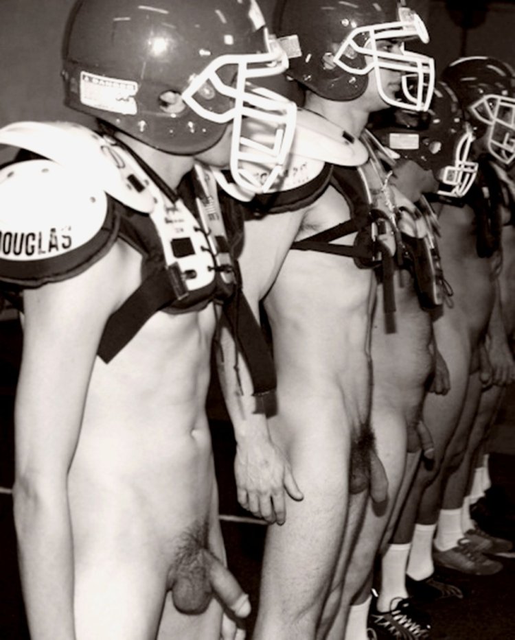 Naked football players in the locker room