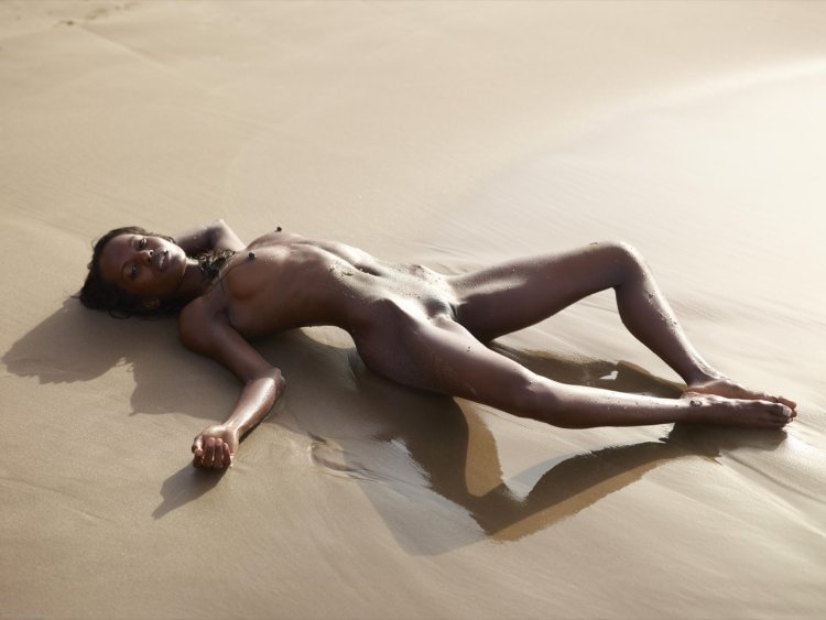 Beautiful naked black women on the beach